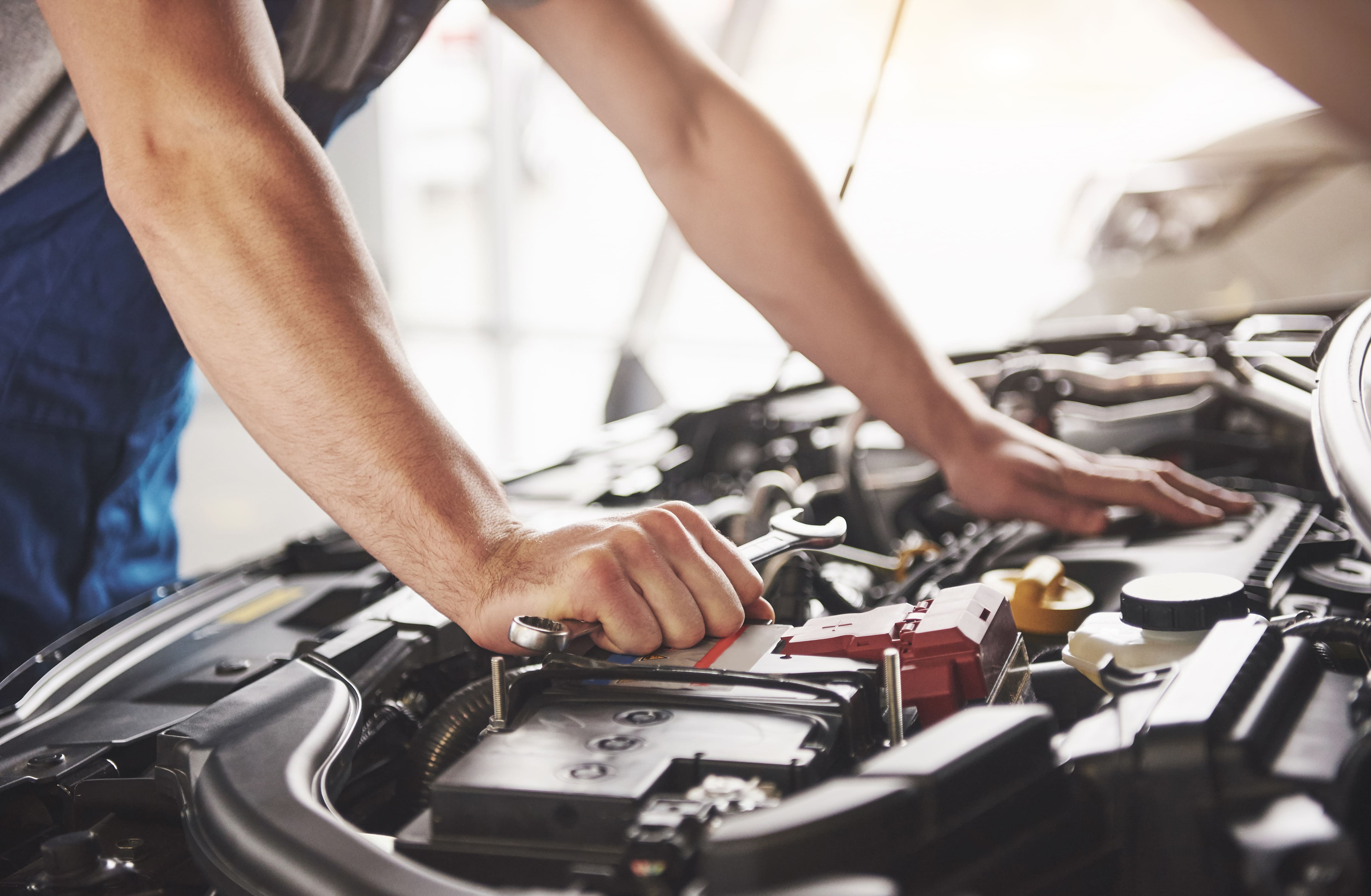auto-mechanic-working-garage-repair-service